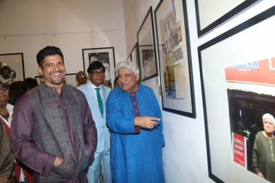 Mumbai: Poet, lyricist and screenwriter Javed Akhtar with his son Farhan Akhtar during an exhibition curated by photojournalist Pradeep Chandra and film historian SMM Ausaja on his birthday in Mumbai on Jan 15, 2020. (Photo: IANS)
