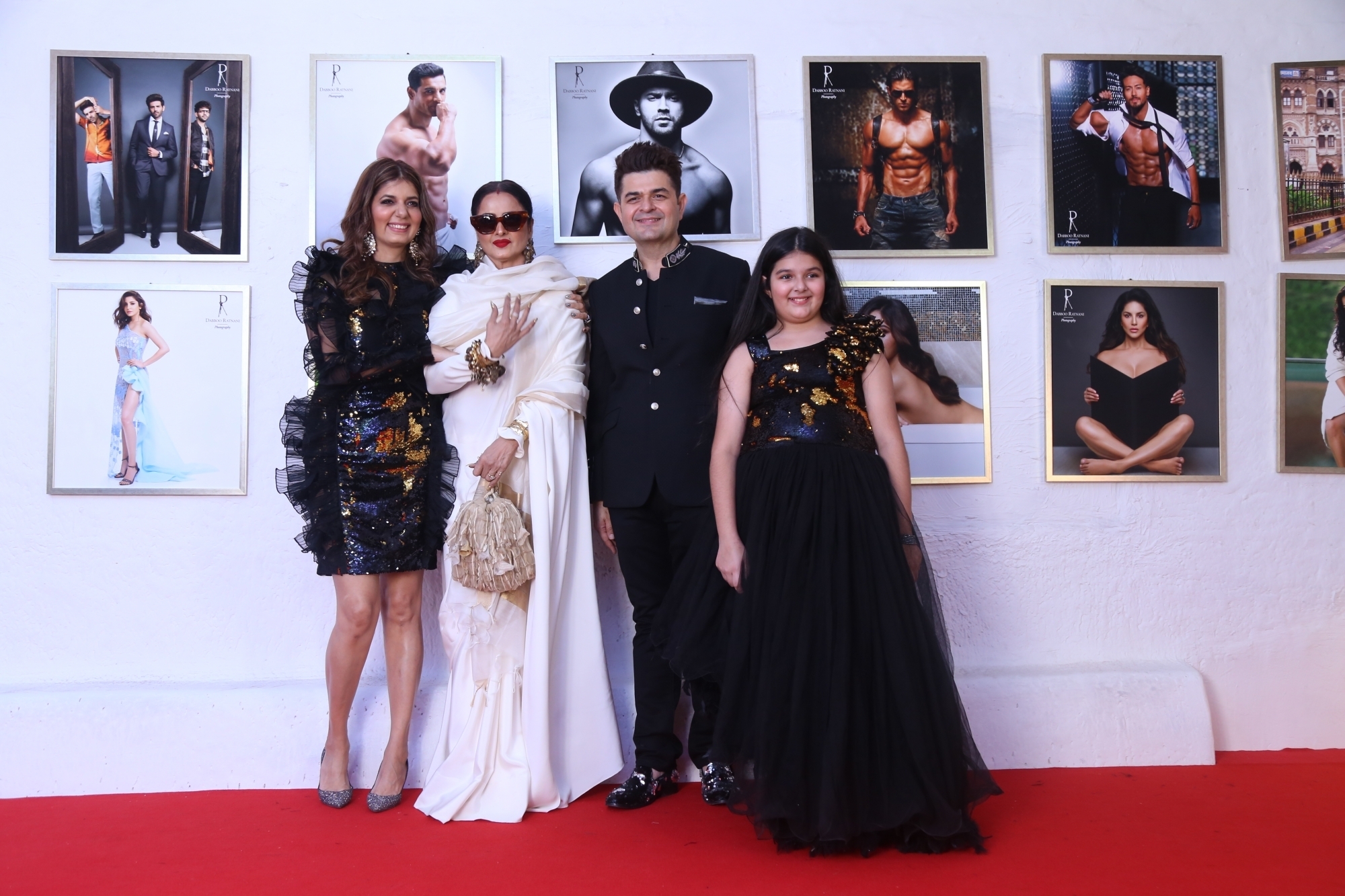 Mumbai: Fashion photographer Dabboo Ratnani with actress Rekha and his wife Manisha D Ratnani and daughter Myrah Ratnani at his calendar launch in Mumbai on Feb 17, 2020. (Photo: IANS)