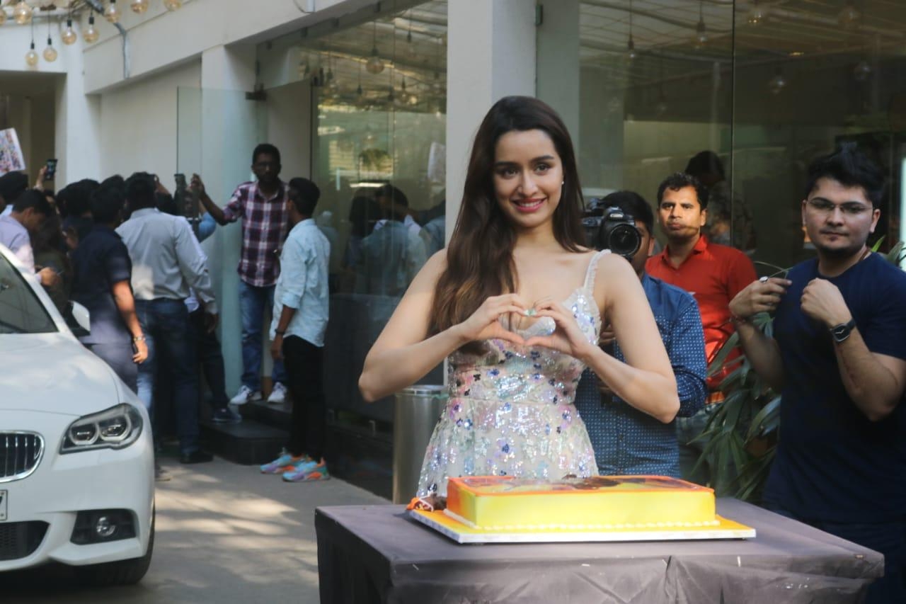 Actress Shraddha Kapoor turned 33 on Tuesday, and she had a mostly busy birthday. Shraddha started her day with a visit to an NGO to spend some time with special kids and senior citizens. She cut the cake with the kids in the morning. Then it was time to be surprised by her "Baaghi 3" co-star Tiger Shroff and the film's production team, who had arranged a grand surprise for her.
