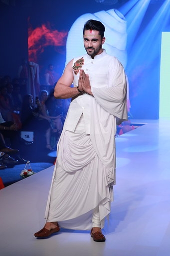 Mumbai: Actor Abhishek Bajaj showcases the creation of fashion designer Rohit Verma at the Bombay Times Fashion Week in Mumbai on March 13, 2020. (Photo: IANS)