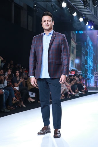 Mumbai: Actor Vivek Oberoi showcases the collection of Viviana Mall at the Bombay Times Fashion Week 2020, in Mumbai on March 14, 2020. (Photo: IANS)