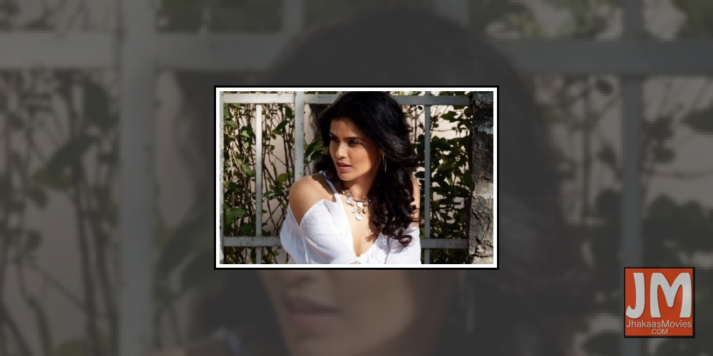 Seema Mishra doesn't mind showing her grey hair .