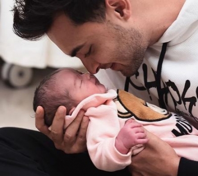Mumbai, April 6 (IANS) It seems like quite a tough task for actor Aayush Sharma to make his three-month-old little daughter Ayat smile.