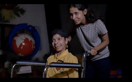 Milli Cafe founder Alina Alam with a worker.