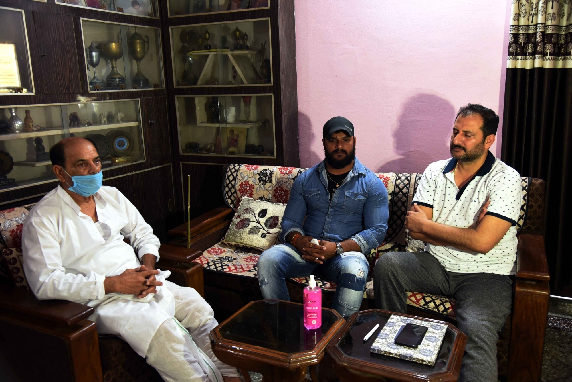 Patna: Bhojpuri actor Khesari Lal Yadav meets Sushant Singh Rajput's father Krishna Kumar Singh, during his visit to the late actor's residence to pay his condolences,  in Patna on June 20, 2020. (Photo: IANS)
