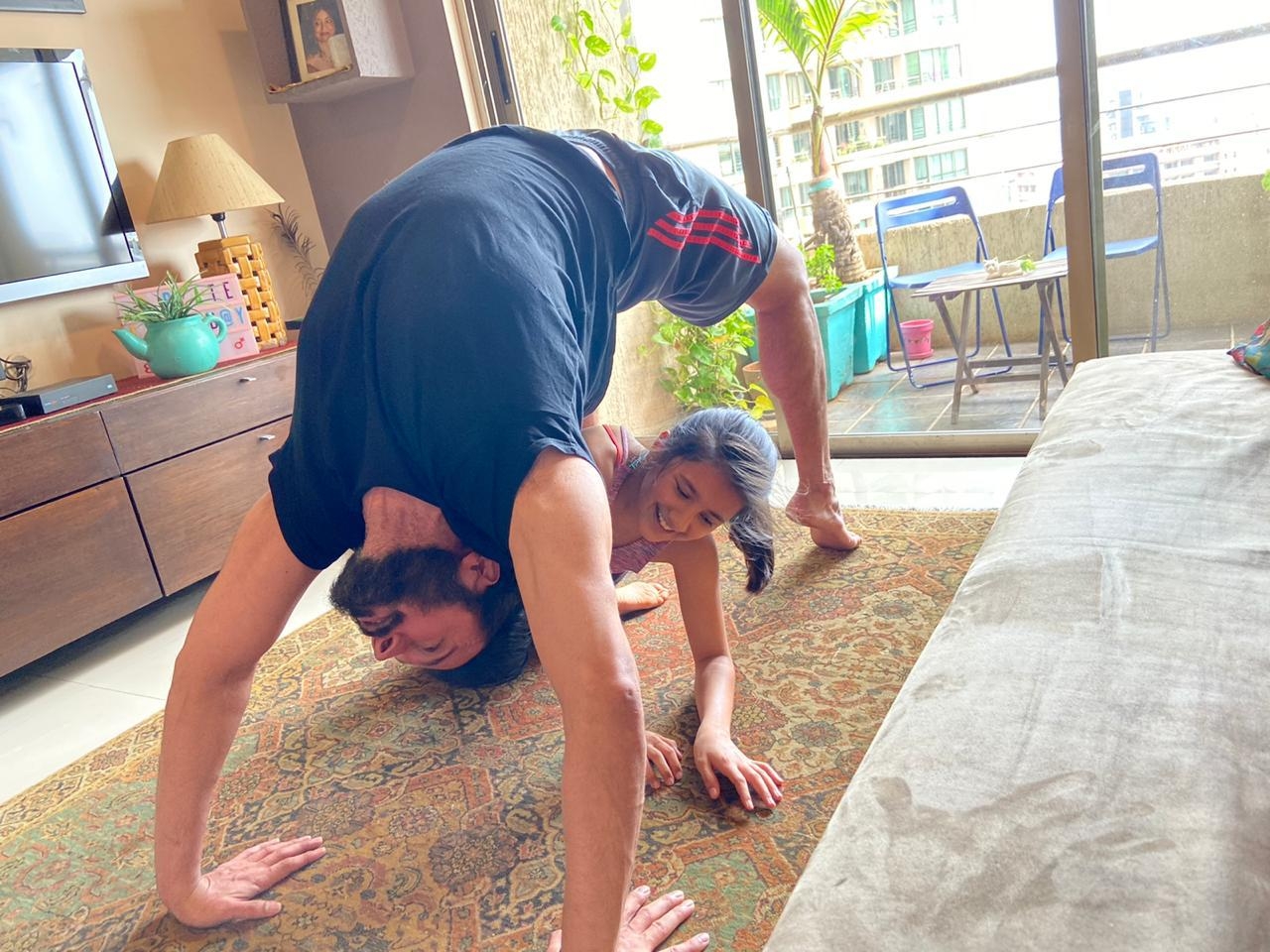 Rajniesh Duggal celebrates Yoga Day with daughter.