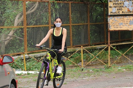 Mumbai: Actress Sonal Chauhan seen cycling at Andheri in Mumbai on Aug 10, 2020. (Photo: IANS)