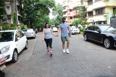 Mumbai: Actors Neha Dhupia and Angad Bedi seen at Bandra in Mumbai on Sep 4, 2020. (Photo: IANS)