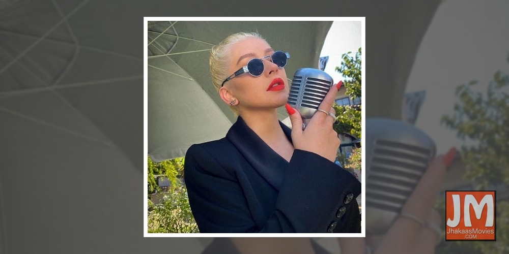 Christina Aguilera didn't find kissing Madonna in 2003 'shocking'.