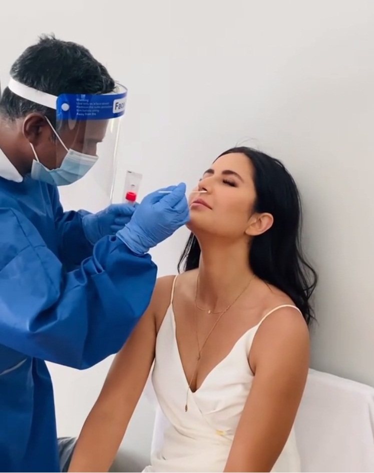 Katrina undergoes Covid test 'with a smile'.