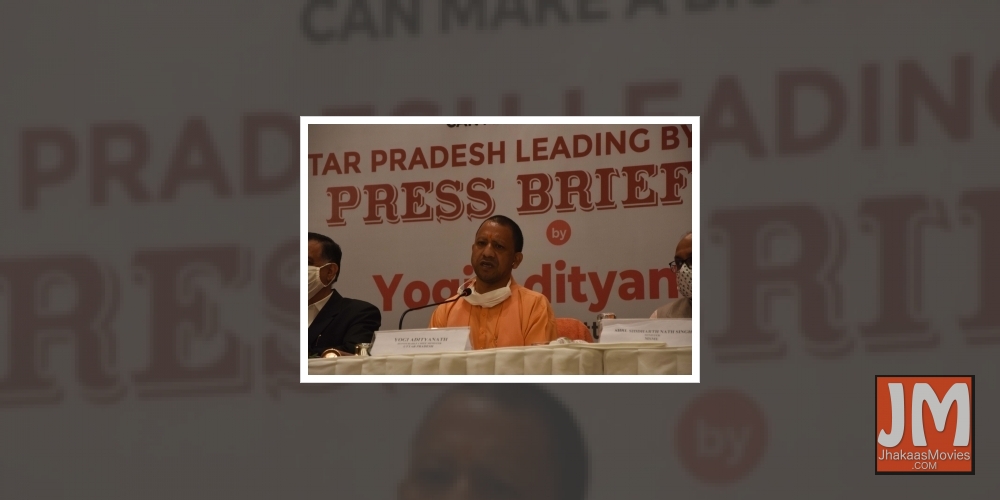 Mumbai: Uttar Pradesh Chief Minister Yogi Adityanath addresses a press briefing in Mumbai on Dec 2, 2020. Yogi Adityanath rang the bell at the Bombay Stock Exchange