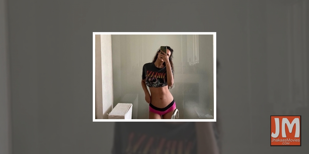 Esha Gupta flaunts toned midrif .