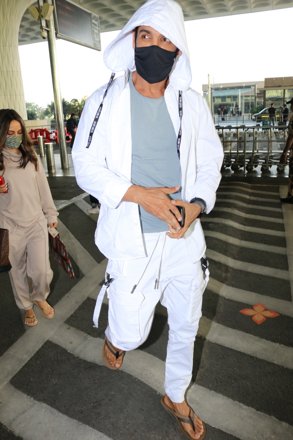 Mumbai: Actor John Abraham seen at the Chhatrapati Shivaji Maharaj International Airport in Mumbai on Dec 23, 2020. (Photo: IANS)
