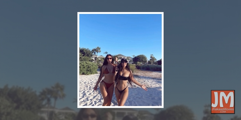 Kim and Kourtney, two of a kind share two-piece thunder.