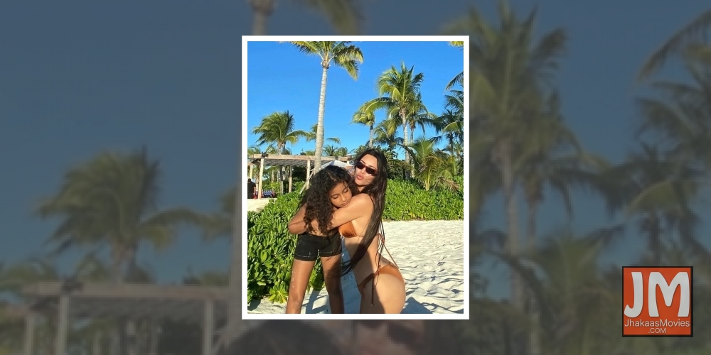 Kim Kardashian flaunts tiny waist in itsy-bitsy bikini.