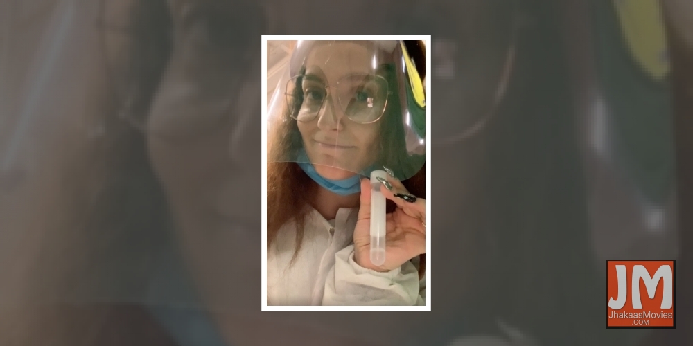 Elli AvrRam takes her own Covid-19 test in Sweden.