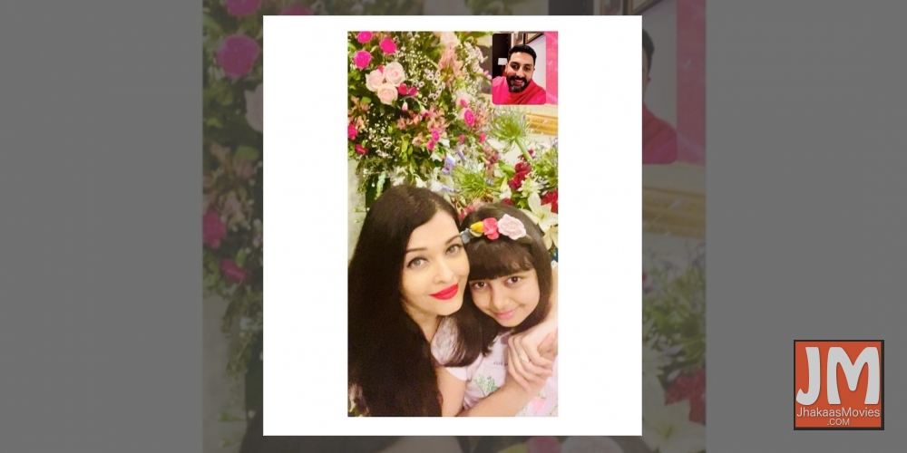 Aishwarya posts anniversary celebration pic, with Abhishek on video call.