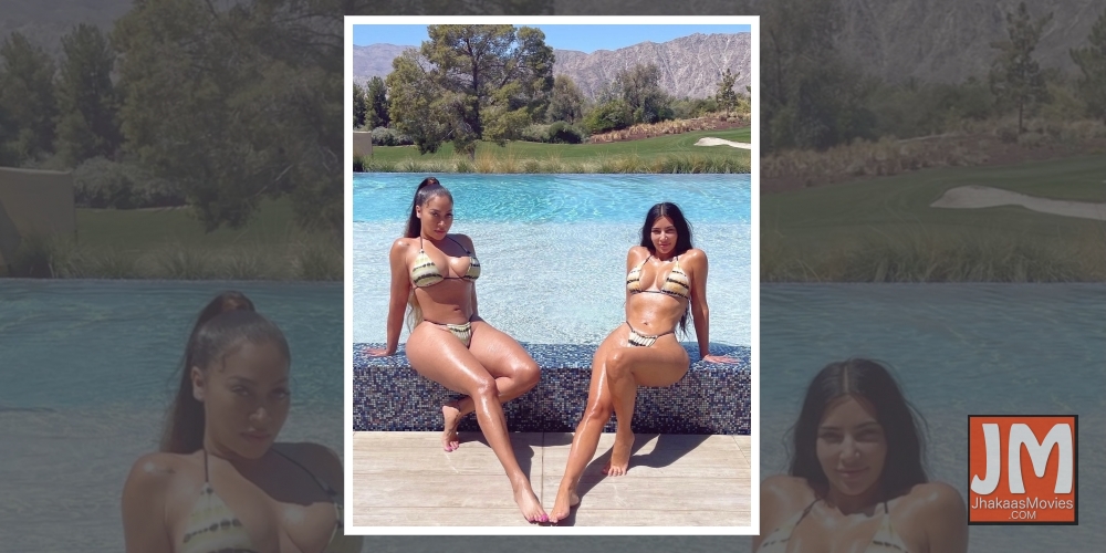 Kim flaunts perfect tan while twinning with friend in bikini.