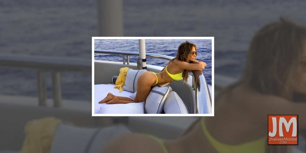 Jennifer Lopez 'gets loud' in neon bikini