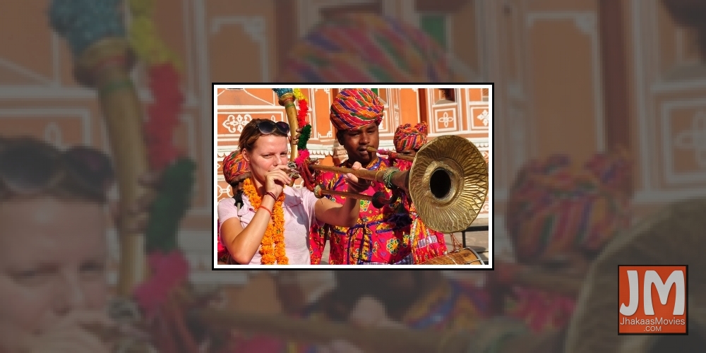 Jaipur: Foreign tourists enjoy themselves at Hawa Mahal on World Tourism Day in Jaipur, on Sep 27, 2015.