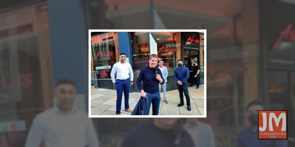 Tom Cruise on Newhall Street outside of Indian restaurant, Asha's at 8.10pm on Saturday, August 21, 2021. The socially-distanced picture includes restaurant manager Nouman Farooqui directly behind him in a suit, wth other staff members either side