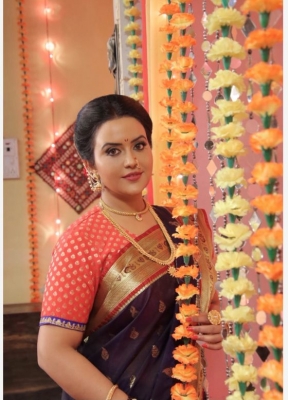 JONITA GANDHI AND AMRUTA FADNAVIS.