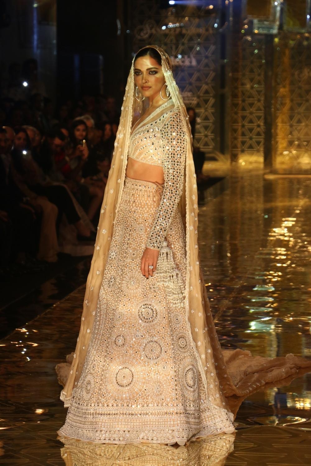 Mumbai: Actress Deepika Padukone showcases a creation of fashion designer Abu Jani-Sandeep Khosla during a fashion show in Mumbai, on Sep 5, 2019. (Photo: IANS)