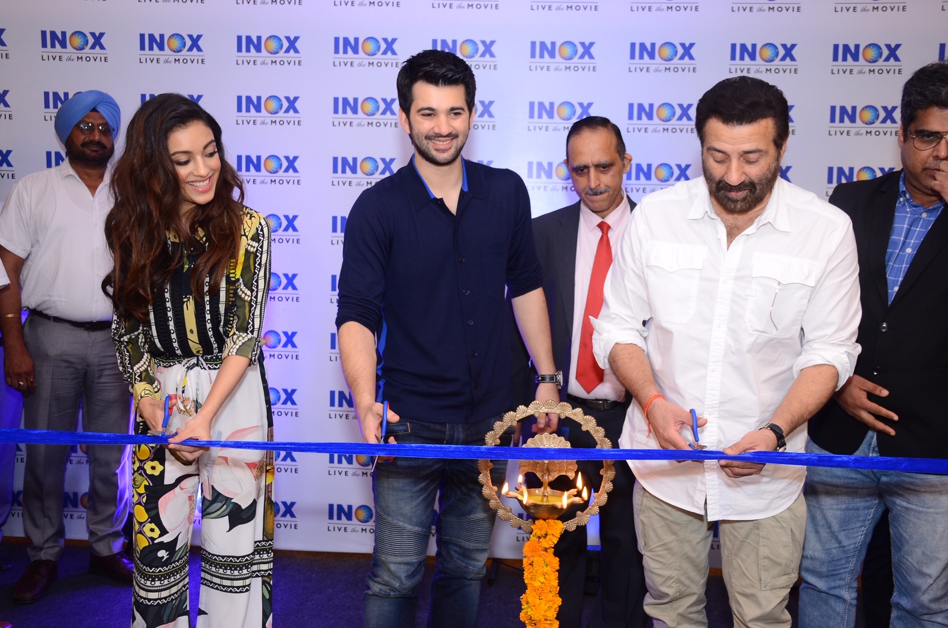 Jalandhar: Actors Sunny Deol, Karan Deol and Sahher Bambba at the launch of a cinema hall in Jalandhar on Sep 14, 2019. (Photo: IANS)