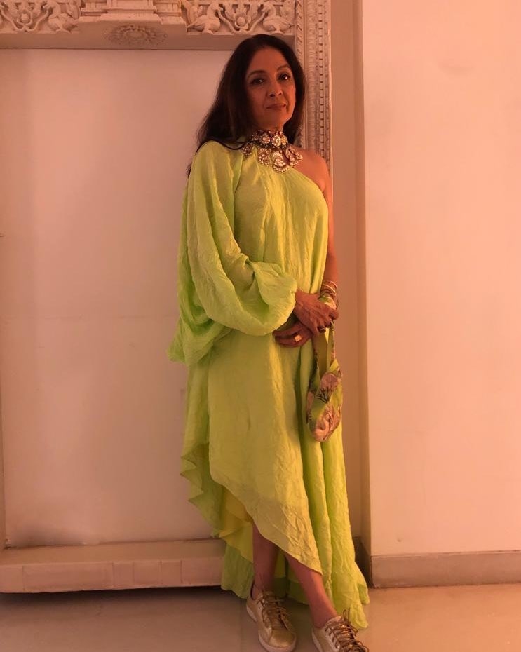 Veteran actress Neena Gupta ditched heels and flowing gown for a gala. Instead, she picked a neon cold shoulder outfit with a pair of sneakers, and won hearts of netizens.