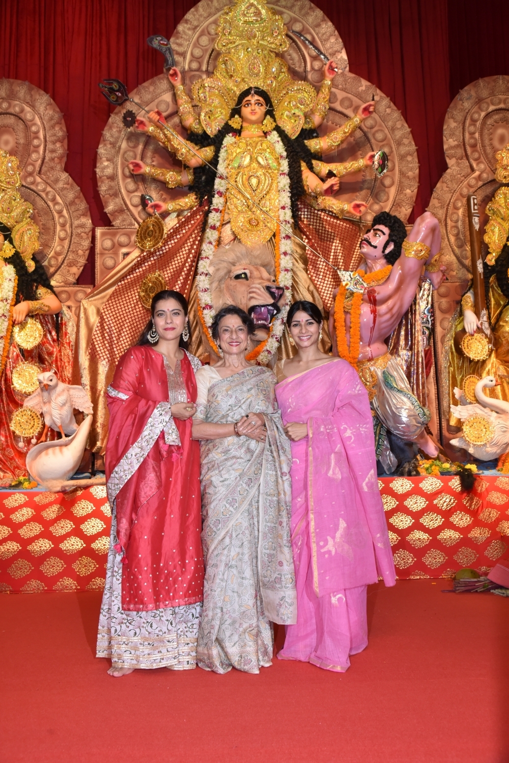 Mumbai: Actresses Kajol and Tanishaa Mukerji with thier mother Tanuja at a Durga Puja pandal in Juhu Mumbai on Oct 4, 2019. (Photo: IANS)