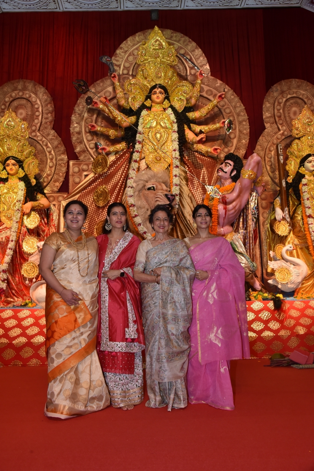 Mumbai: Actresses Kajol and Tanishaa Mukerji with thier mother Tanuja at a Durga Puja pandal in Juhu Mumbai on Oct 4, 2019. (Photo: IANS)