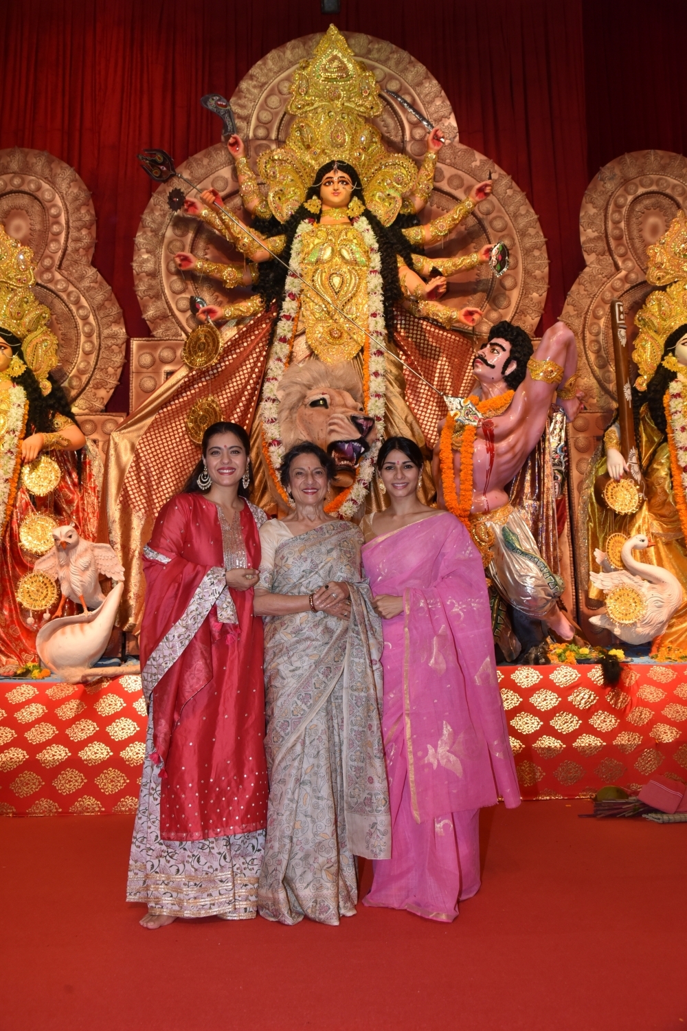Mumbai: Actresses Kajol and Tanishaa Mukerji with thier mother Tanuja at a Durga Puja pandal in Juhu Mumbai on Oct 4, 2019. (Photo: IANS)