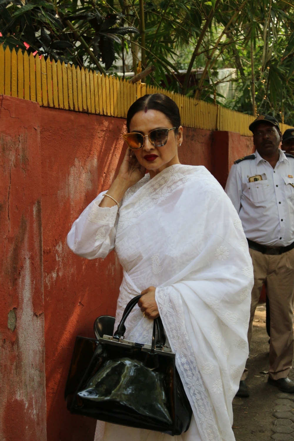 Mumbai: Actress Rekha at the funeral of Shaukat Azmi - veteran actress, wife of renowned Late Urdu poet and lyricist Kaifi Azmi and mother of actress Shabana Azmi - in Mumbai on Nov 23, 2019. (Photo: IANS)