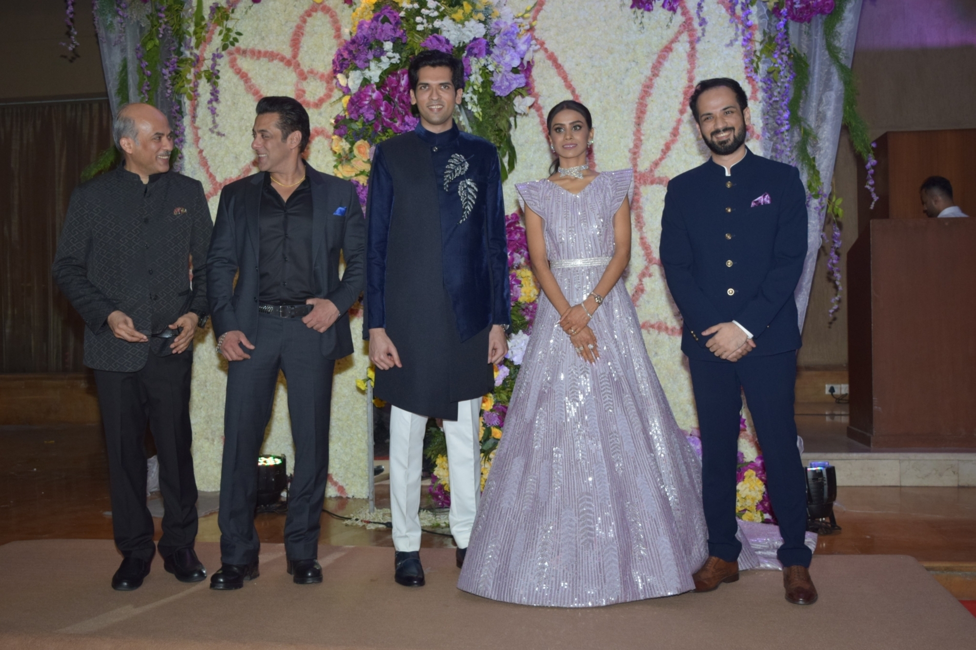 Mumbai: Filmmaker Sooraj Barjatya and actors Salman Khan and Madhuri Dixit with the newly weds Devaansh Barjatya (Sooraj Barjatya's son) and Nandini (Barjatya's daughter-in-law) at their wedding reception in Mumbai on Nov 29, 2019. (Photo: IANS)