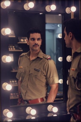 Actor Angad Bedi is not only aiming to get the look of a police officer in upcoming series 