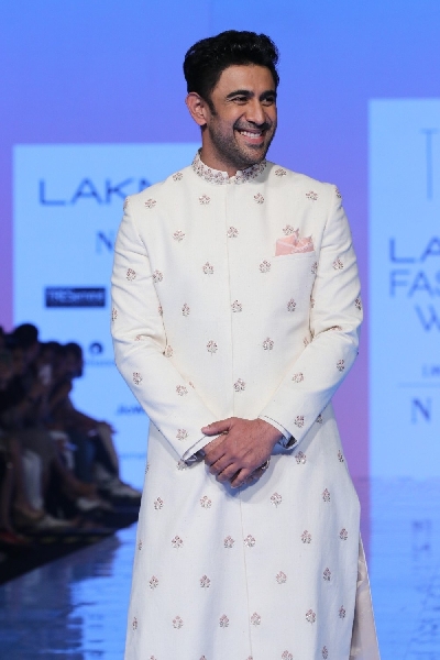 Mumbai: Actor Amit Sadh showcases the creation of Tisa Studio at the Lakme Fashion Week Summer/Resort 2020 grand finale, in Mumbai on Feb 16, 2020. (Photo: IANS)
