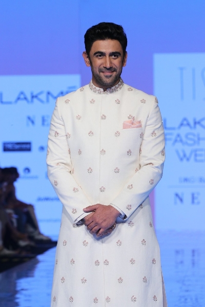 Mumbai: Actor Amit Sadh showcases the creation of Tisa Studio at the Lakme Fashion Week Summer/Resort 2020 grand finale, in Mumbai on Feb 16, 2020. (Photo: IANS)