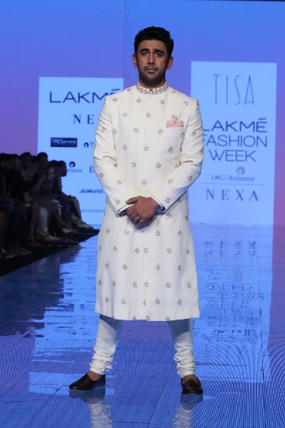 Mumbai: Actor Amit Sadh showcases the creation of Tisa Studio at the Lakme Fashion Week Summer/Resort 2020 grand finale, in Mumbai on Feb 16, 2020. (Photo: IANS)