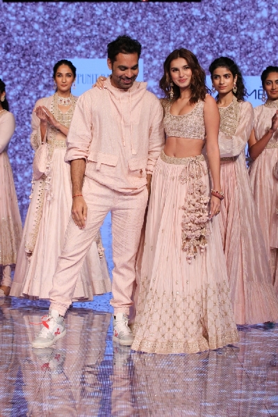 Mumbai: Actress and showstopper Tara Sutaria with fashion designer Punit Balana on Day 5 of the Lakme Fashion Week Summer/Resort 2020, in Mumbai on Feb 15, 2020. (Photo: IANS)