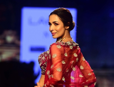 Mumbai: Actress Malaika Arora showcases the creation of fashion designer Varun Chakkilam on Day 4 of the Lakme Fashion Week Summer/Resort 2020, in Mumbai on Feb 14, 2020. (Photo: IANS)