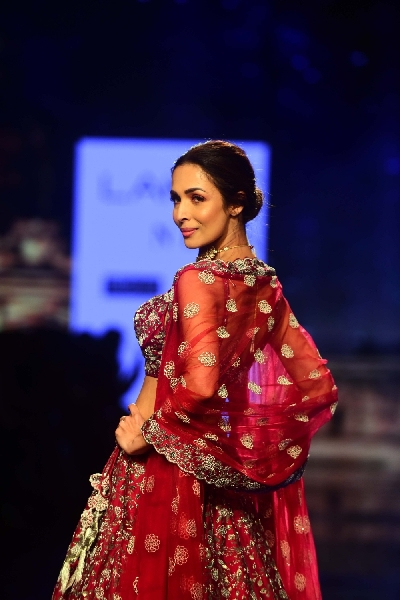 Mumbai: Actress Malaika Arora showcases the creation of fashion designer Varun Chakkilam on Day 4 of the Lakme Fashion Week Summer/Resort 2020, in Mumbai on Feb 14, 2020. (Photo: IANS)