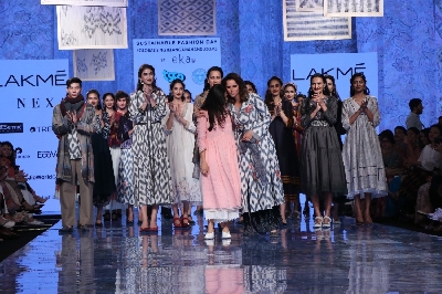 Mumbai: Indian Tennis star and showstopper Sania Mirza and other models with designer Rina Singh on Day 3 of the Lakme Fashion Week Summer/Resort 2020, in Mumbai on Feb 13, 2020. (Photo: IANS)