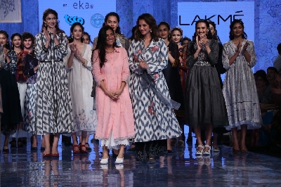Mumbai: Indian Tennis star and showstopper Sania Mirza and other models with designer Rina Singh on Day 3 of the Lakme Fashion Week Summer/Resort 2020, in Mumbai on Feb 13, 2020. (Photo: IANS)