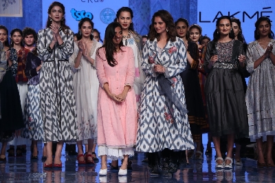Mumbai: Indian Tennis star and showstopper Sania Mirza and other models with designer Rina Singh on Day 3 of the Lakme Fashion Week Summer/Resort 2020, in Mumbai on Feb 13, 2020. (Photo: IANS)