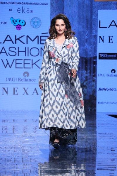 Mumbai: Indian Tennis star and showstopper Sania Mirza walks the ramp for designer Rina Singh on Day 3 of the Lakme Fashion Week Summer/Resort 2020, in Mumbai on Feb 13, 2020. (Photo: IANS)