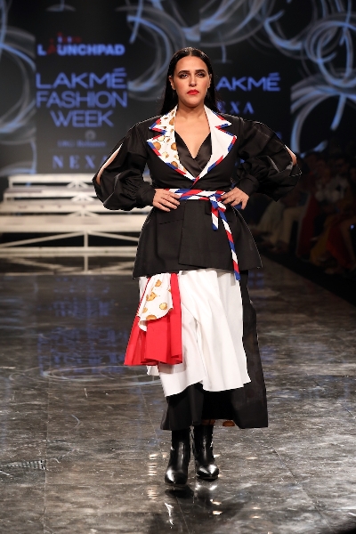 Mumbai: Actress Neha Dhupia showcases the creation of Ajio on Day 2 of the Lakme Fashion Week Summer/Resort 2020, in Mumbai on Feb 12, 2020. (Photo: IANS)