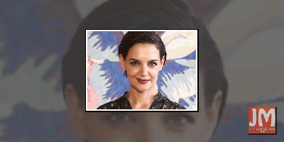 Katie Holmes' new beau 'can't get enough' of her