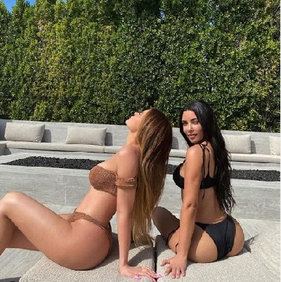 Kylie Jenner enjoys a bikini-ful pool day.