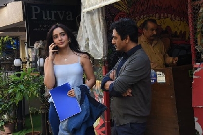 Mumbai: Actors Nawazuddin Siddiqui and Neha Sharma seen at Versova in Mumbai on March 16, 2020. (Photo: IANS)
