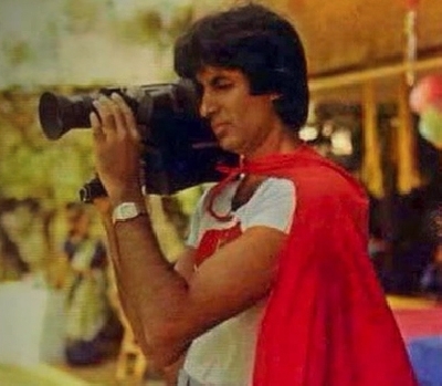 Megastar Amitabh Bachchan shared a throwback photograph of himself from his son Abhishek Bachchan's themed birthday party. In the photograph, Amitabh can be seen dressed as superman and holding a video camera.